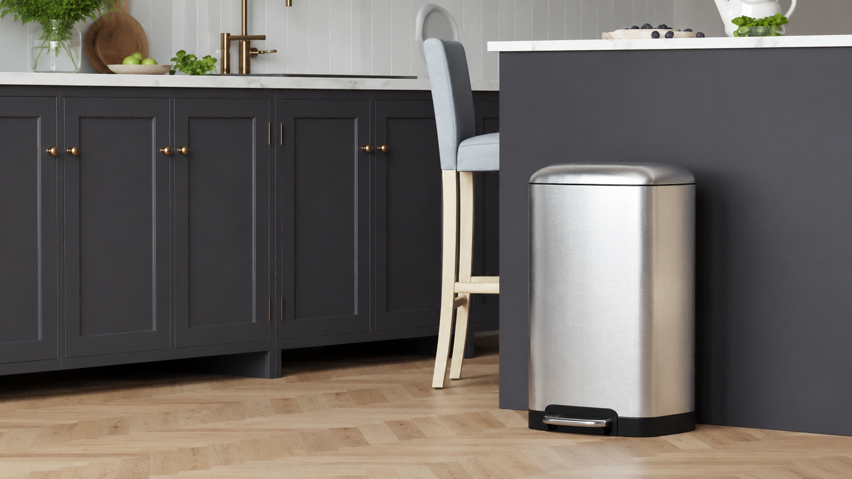 SONGMICS HOME single-compartment stainless steel trash can in a kitchen setting.